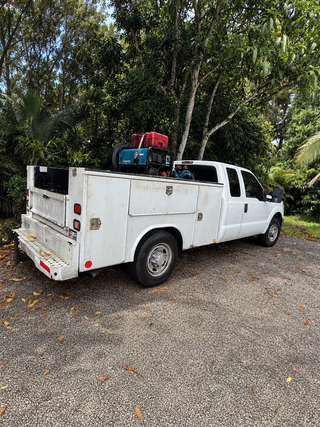 CV Equipment white service truck